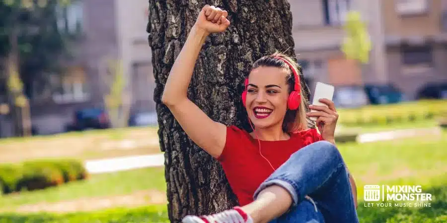 Young Lady Enjoying Music On Headphones Young Lady Enjoying Music On Headphones